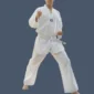 Man wearing white Taekwondo uniform.