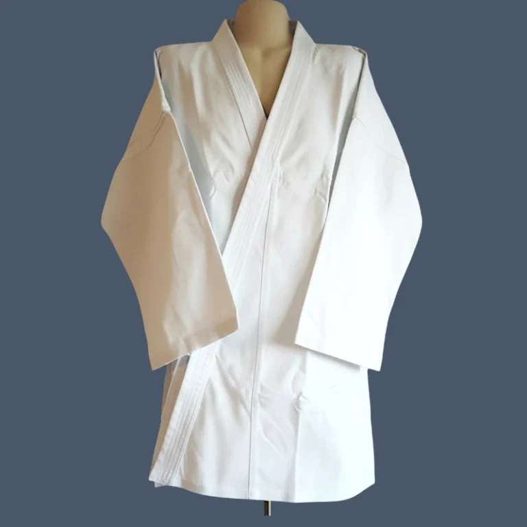 Image shows front view of a karate jacket made in 100% cotton.