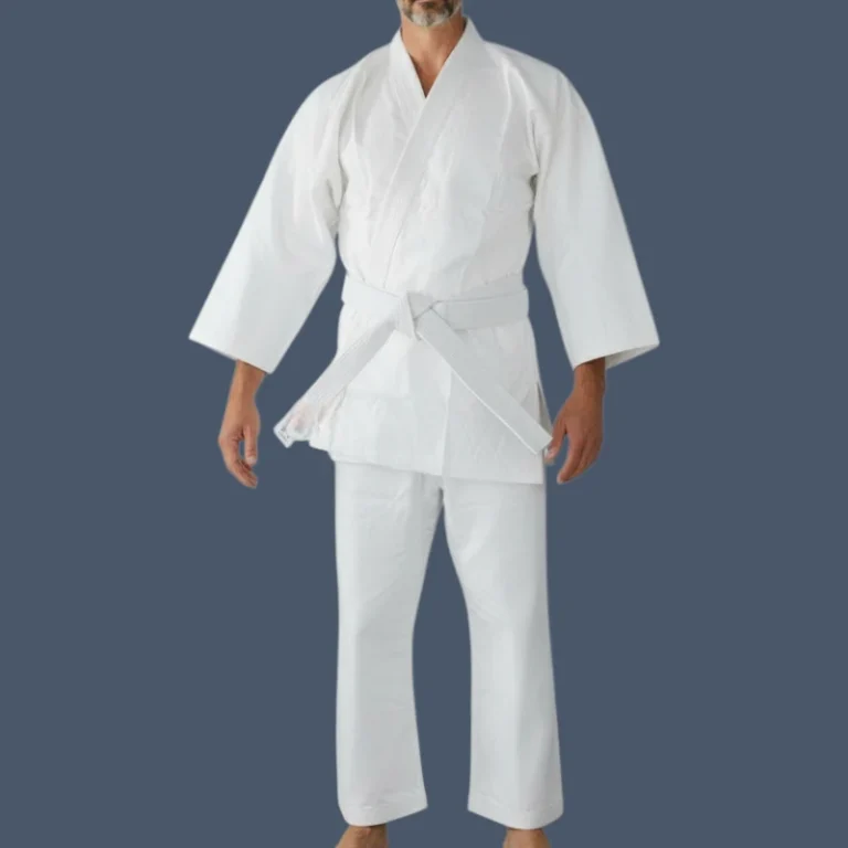 Front view of man wearing a white all cotton karate uniform.