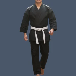 Image of man wearing black karate uniform.