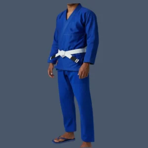 Image shows side front view of man wearing a blue BJJ gi