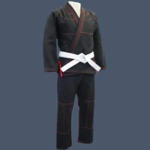 Image shows front view black BJJ gi with a red trim.