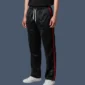 FRont view of man wearing kickboxing pants made in black satin.