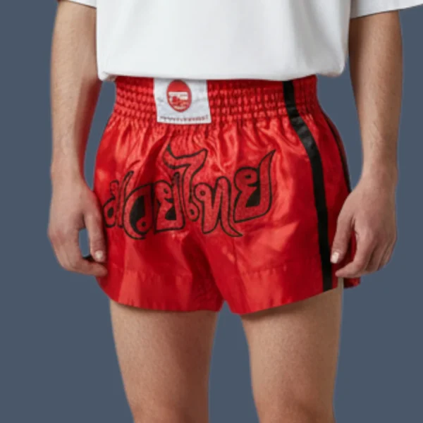 Man wearing red Muay Thai shorts