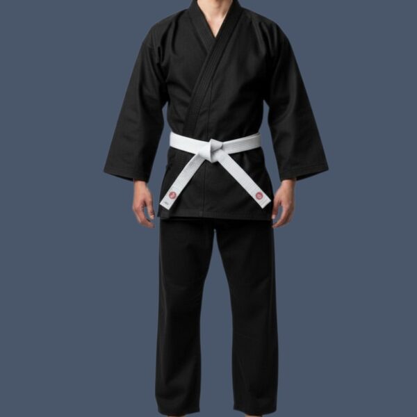 12ozblackgi_model image of male wearing black karate uniform made in 12oz canvas fabric