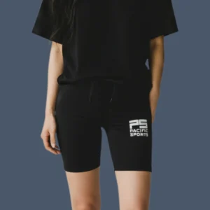 Front view of womens black compression shorts with contrasting white logo.